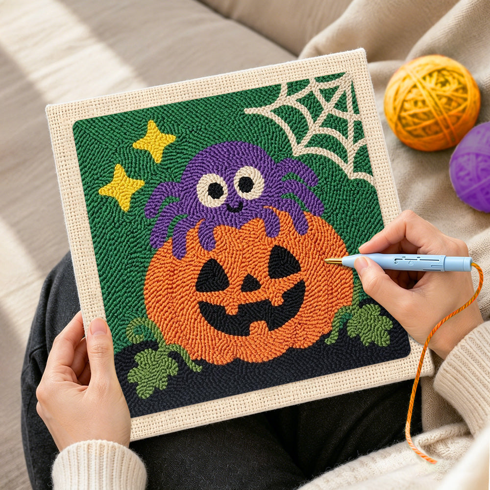 Creating handmade cute spider pumpkin punch needle artwork