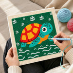 Creating handmade cute swimming sea turtle punch needle artwork