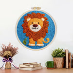 Finished cute thick-maned lion artwork displayed on a wall