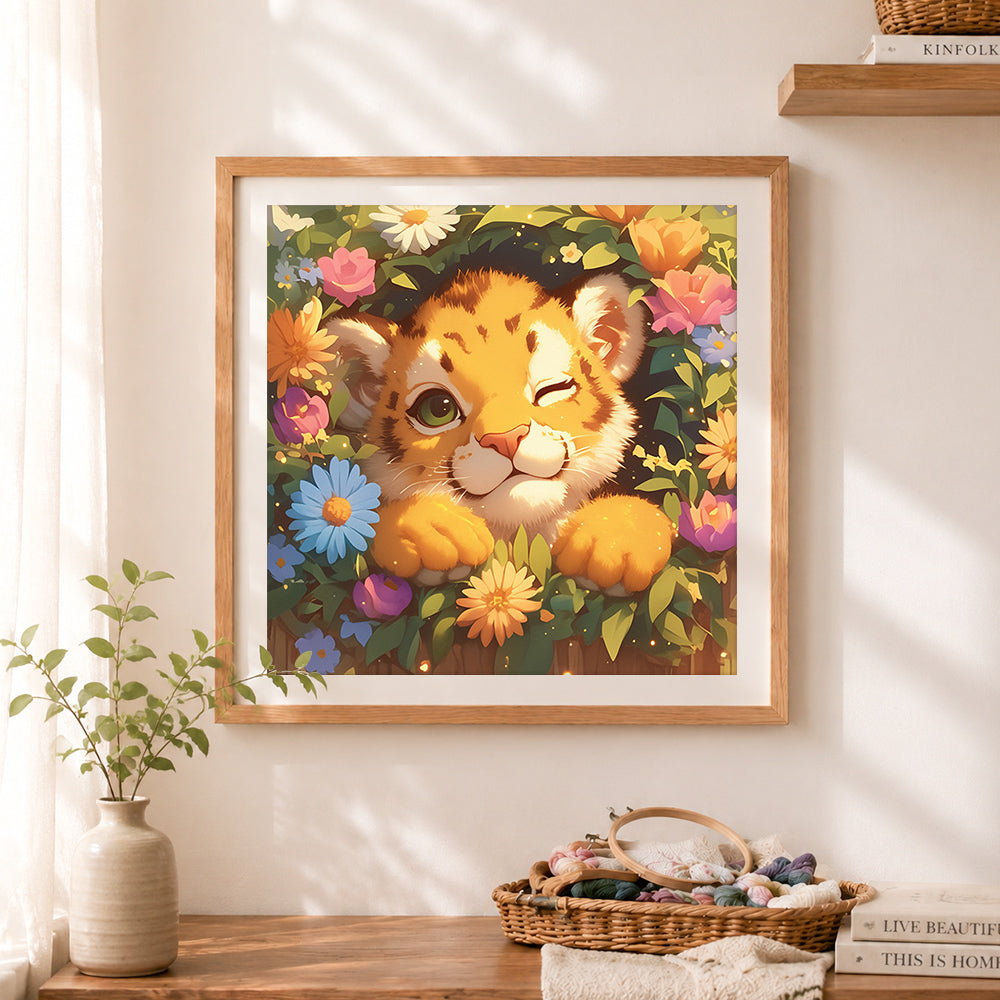 Finished cute tiger cub hiding in blooms cross stitch artwork displayed as home decor
