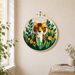 Cute tiger cub in the jungle needle felt wall art displayed in a bright home interior