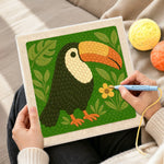 Creating handmade cute tropical toucan punch needle artwork