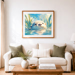 Finished cute water otter cross stitch artwork displayed as home decor