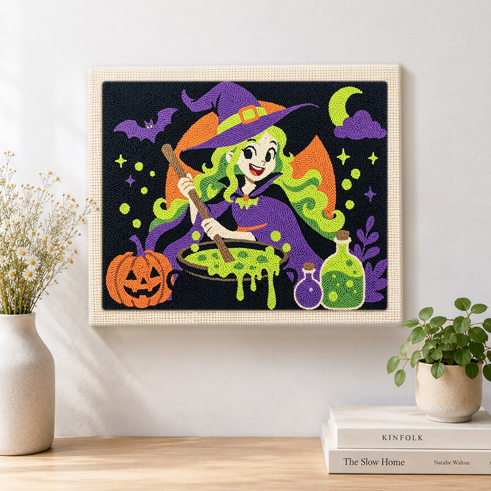 Finished cute witch making potion artwork displayed on a wall