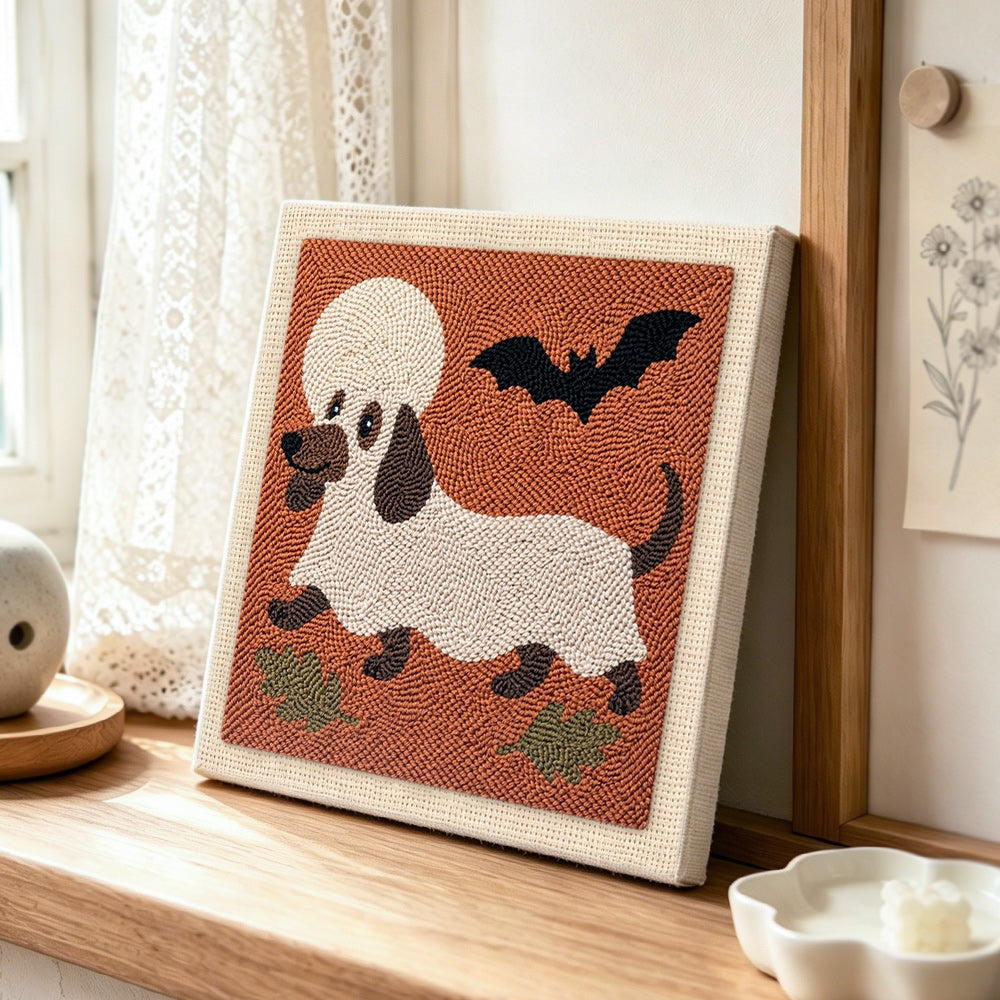 Dachshund ghost disguise punch needle artwork displayed on a table