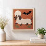 Finished dachshund ghost disguise artwork displayed on a wall