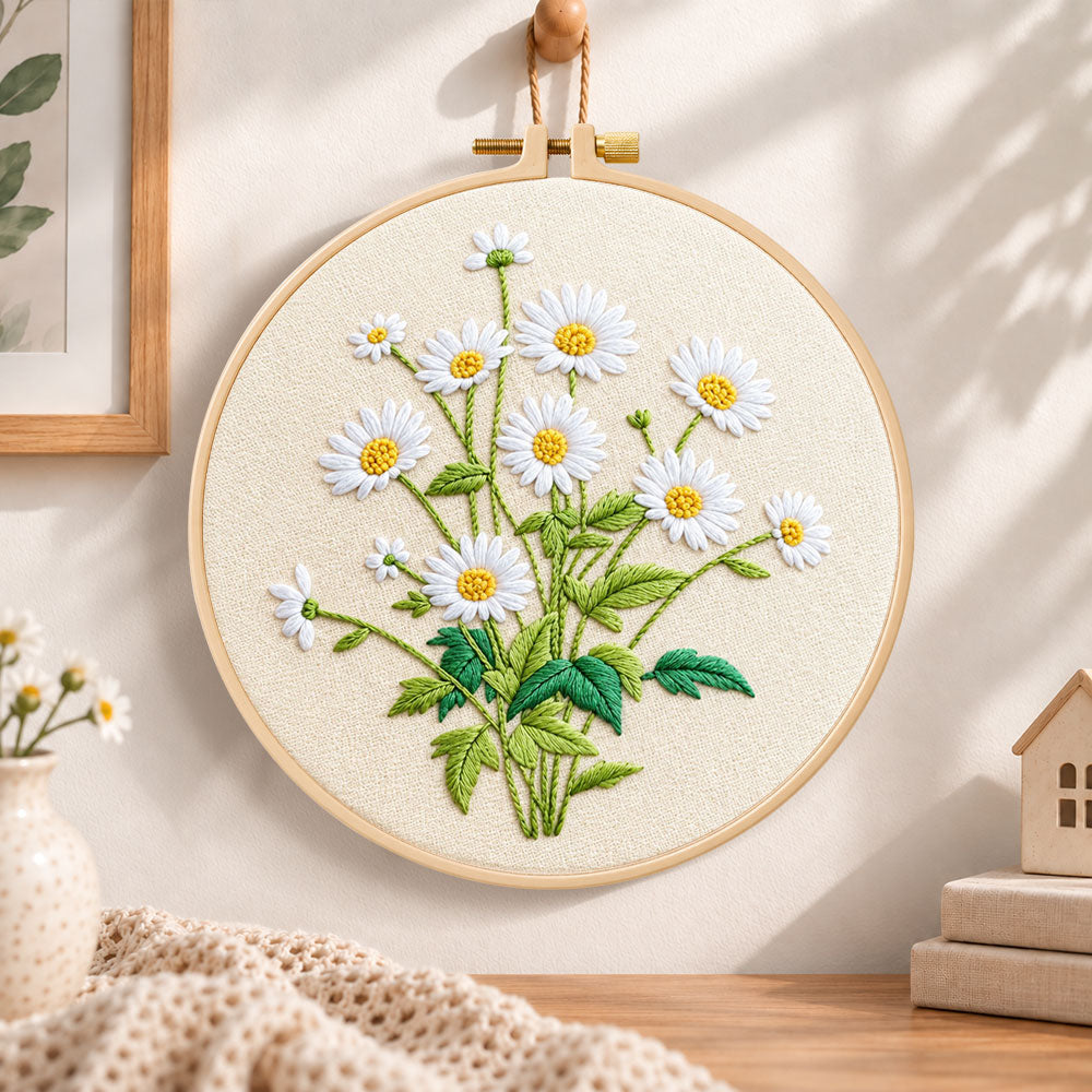 Daisies on beige background embroidery hoop wall art displayed as warm and cozy handmade home decor