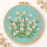 Daisies on teal fabric embroidery kit