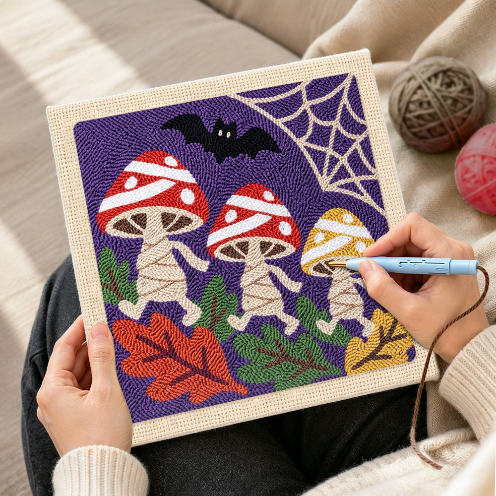 Creating handmade dancing halloween mushrooms punch needle artwork