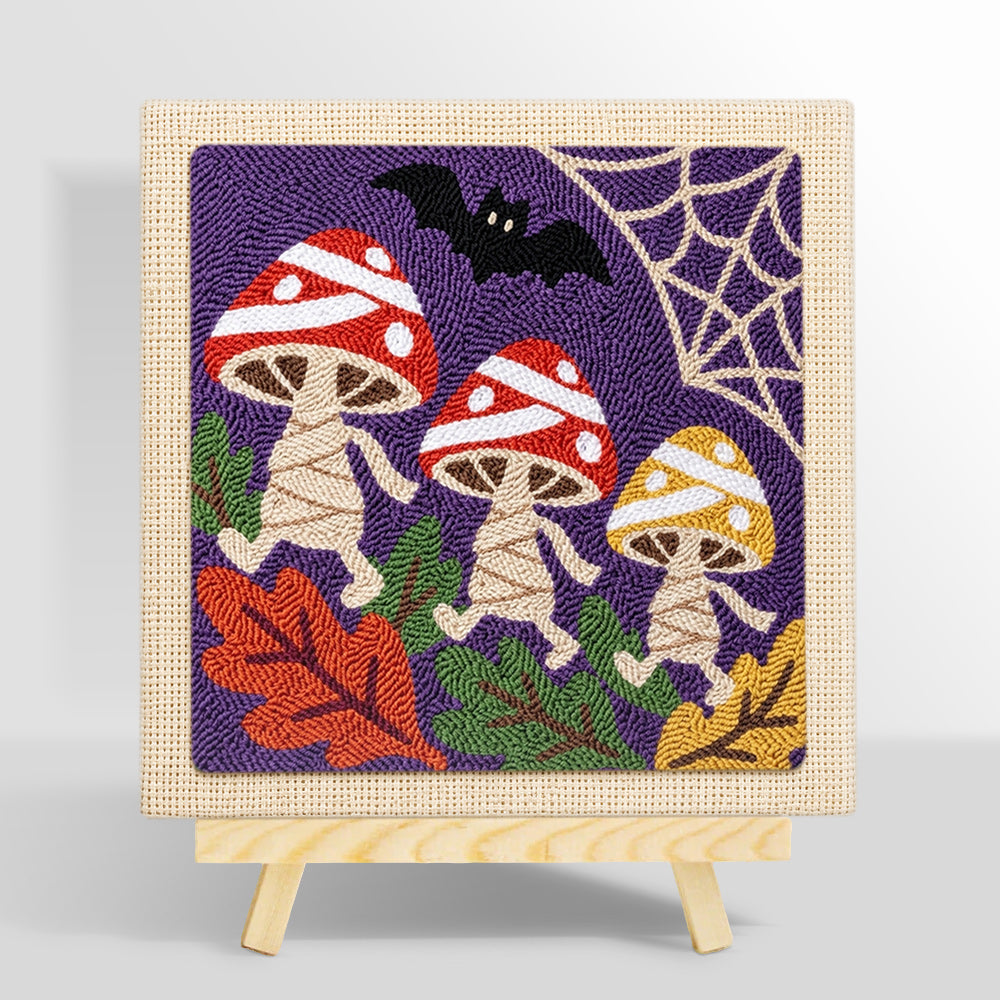 Finished dancing halloween mushrooms artwork displayed on a wall