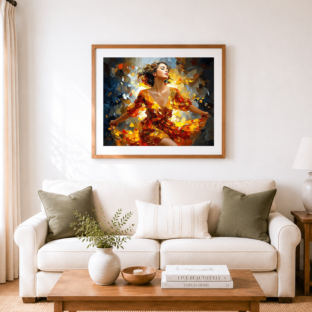 Finished dancing lady in golden hues cross stitch artwork displayed as home decor
