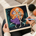 Creating handmade dancing skeleton couple punch needle artwork