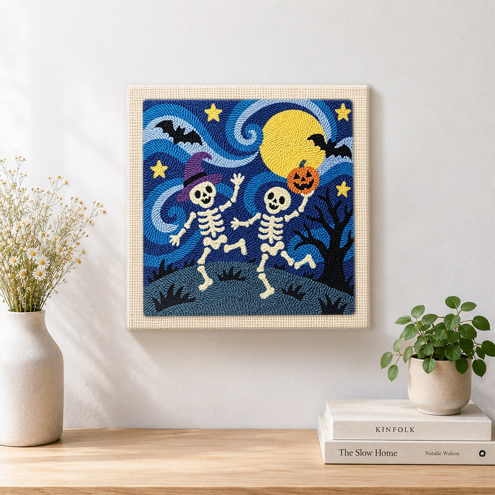 Finished dancing skeletons under moon artwork displayed on a wall