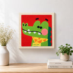 Finished dapper crocodile with bow tie artwork displayed on a wall