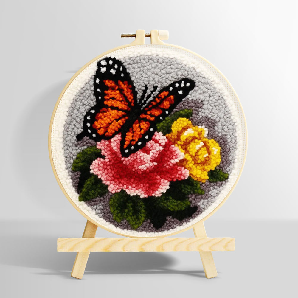 Dark-colored butterfly and flowers punch needle kit for beginners