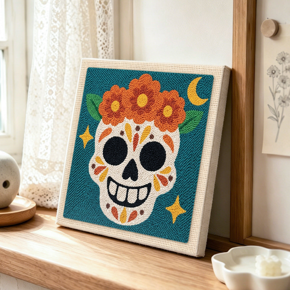 Day of dead floral skull punch needle artwork displayed on a table
