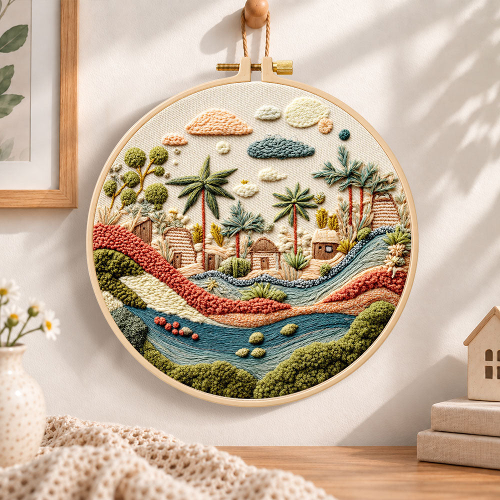 Desert stream hamlet embroidery hoop wall art displayed as warm and cozy handmade home decor