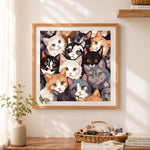 Finished diverse kittens pattern cross stitch artwork displayed as home decor