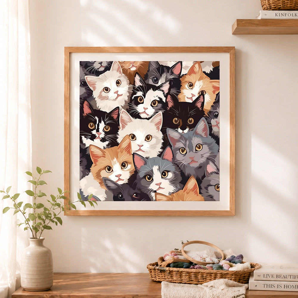 Finished diverse kittens pattern cross stitch artwork displayed as home decor