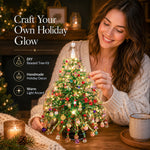Woman creating a DIY Beaded Christmas Tree Kit with colorful beads and holiday charms