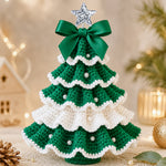 DIY Crochet Christmas Tree Kit in green and white with layered crochet details, pearl decorations and a festive bow