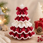 DIY Crochet Christmas Tree Kit in red and white with layered crochet details, pearl decorations and a festive bow