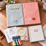 Complete DIY embroidery stitch practice book kit with fabric pages, embroidery floss, hoop, tools and instructions