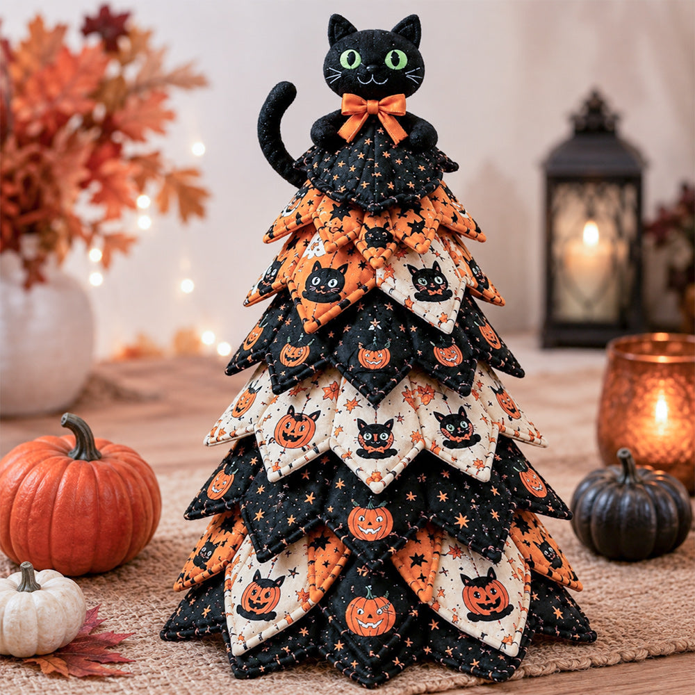 DIY quilted Halloween tree kit with black cat topper, pumpkins and orange black fabric