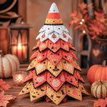 DIY quilted Halloween tree kit with candy corn topper and orange yellow festive fabric