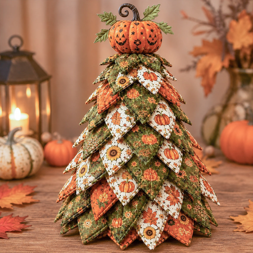 DIY quilted Halloween tree kit with pumpkin topper, fall leaves and green orange fabric
