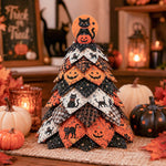 DIY quilted Halloween tree kit with black cat and pumpkin topper and orange black patchwork fabric