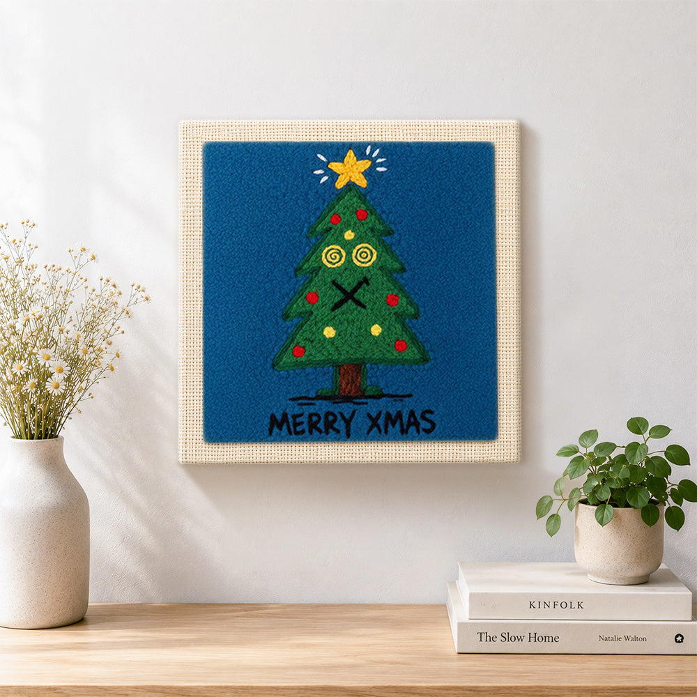 Finished dizzy eyes xmas tree artwork displayed on a wall