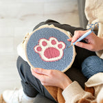Creating handmade dog paw print punch needle artwork