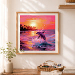 Finished dolphin jumping at tropical sunset cross stitch artwork displayed as home decor