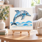 Dolphin sea glass art kit displayed as seasonal home decor