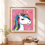 Finished dreamy star unicorn cross stitch artwork displayed as home decor