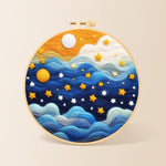 Drifting blue clouds and yellow stars needle felting kit for beginners with a round wooden frame