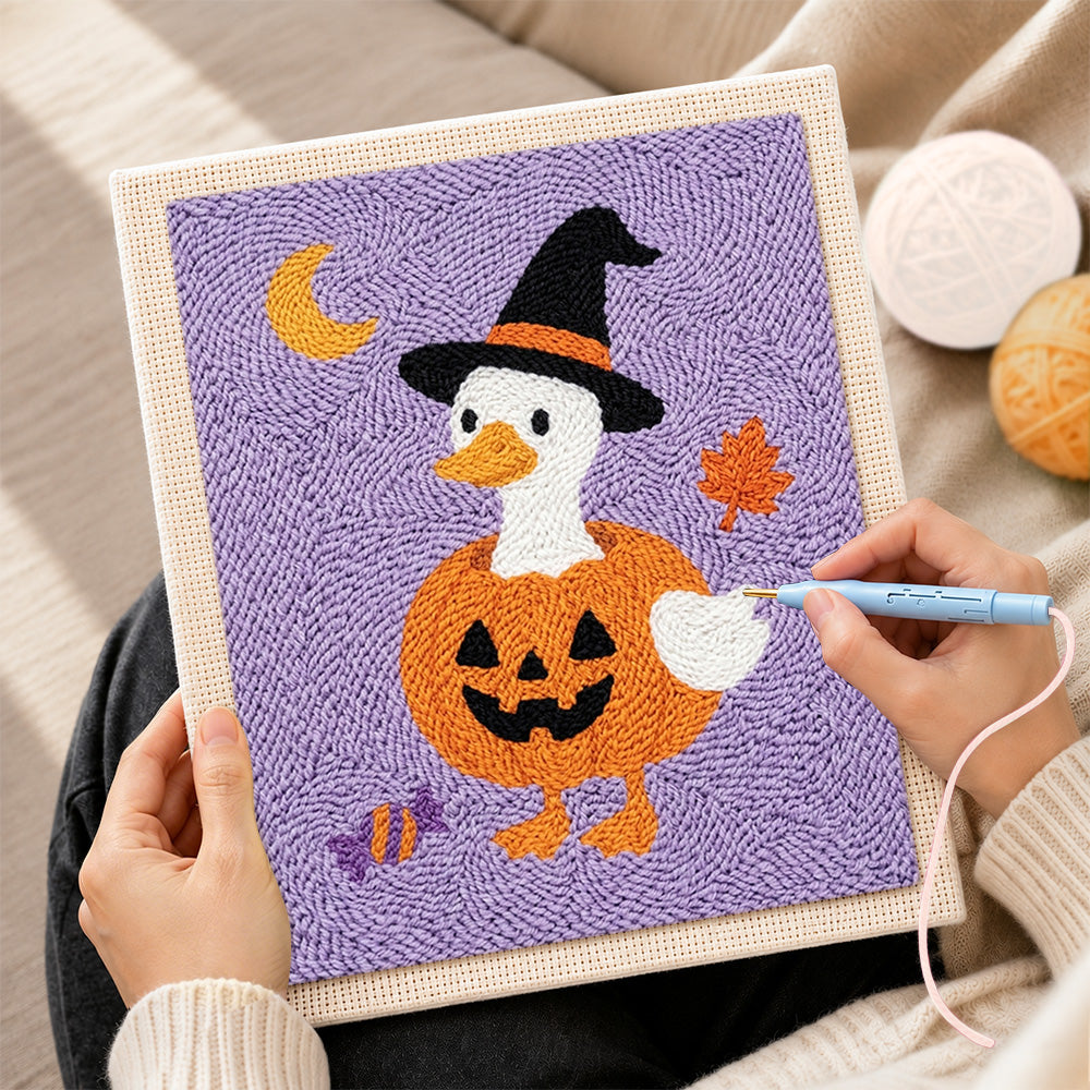 Creating handmade duck in pumpkin witch outfit punch needle artwork
