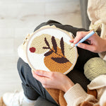 Creating handmade earthy tones botanical leaf punch needle artwork