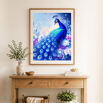 Finished elegant blue peacock cross stitch artwork displayed as home decor
