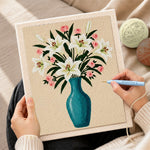 Creating handmade elegant lily and pink roses in blue vase punch needle artwork