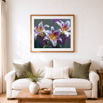 Finished elegant purple lilies cross stitch artwork displayed as home decor