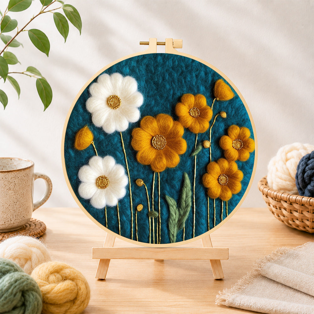 Finished elegant white and yellow daisies needle felting displayed on a wooden easel