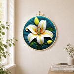 Elegant white lily needle felt wall art displayed in a bright home interior