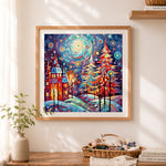 Finished enchanted cosmic christmas tree cross stitch artwork displayed as home decor
