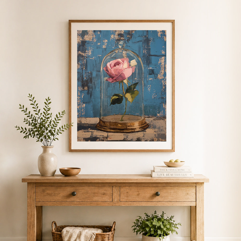 Finished enchanted pink rose cross stitch artwork displayed as home decor