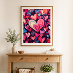 Finished endless hearts cross stitch artwork displayed as home decor