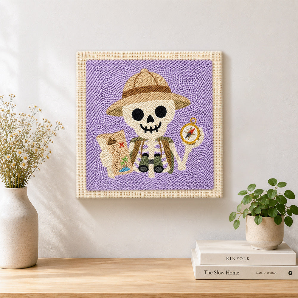 Finished explorer skeleton artwork displayed on a wall