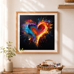 Finished explosive colorful paint heart on black cross stitch artwork displayed as home decor