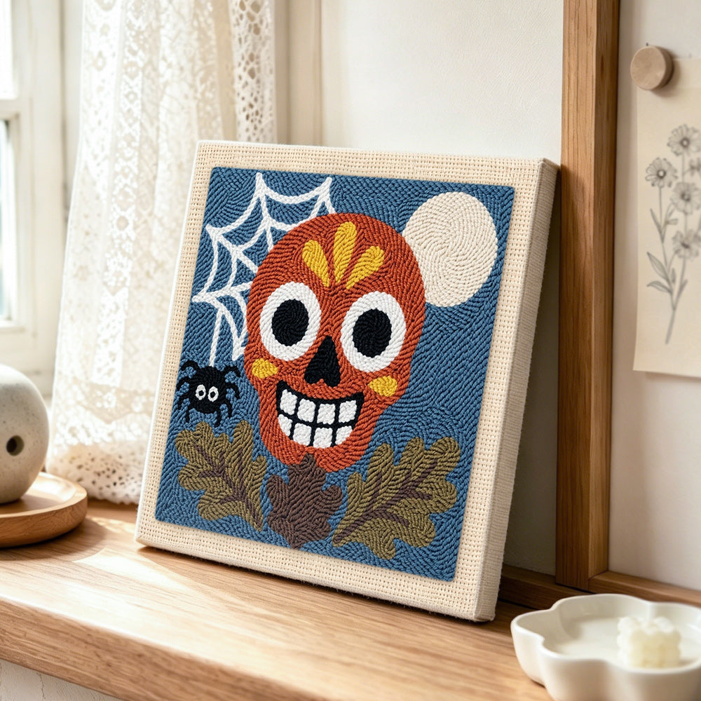 Fall sugar skull art punch needle artwork displayed on a table